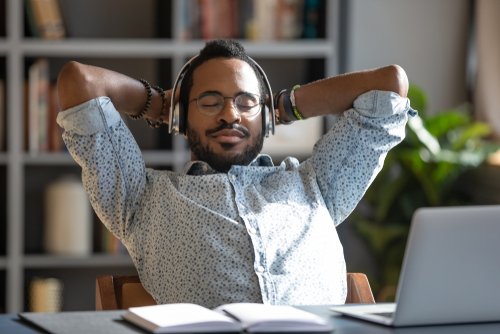Relaxed,,Business,Man,Wear,Wireless,Headphones,Enjoy,Listen,Music